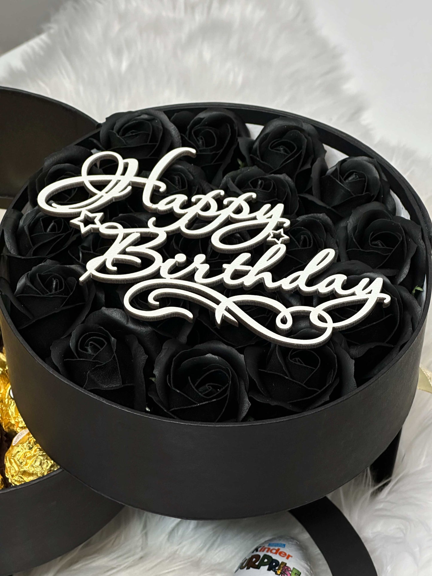 Close-up of the luxurious soap roses from the three-tiered black gift box, adding charm and sophistication to this stunning present.