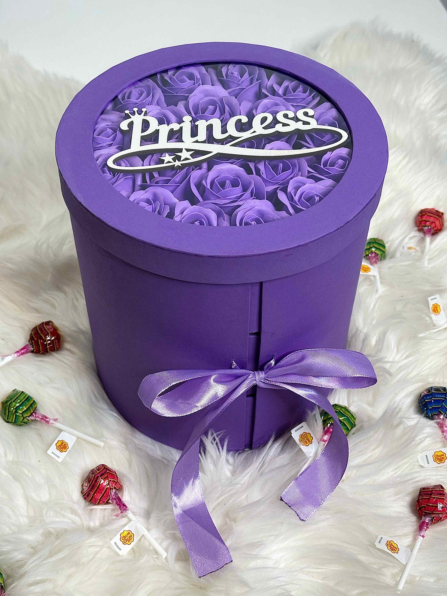 Close-up of the vibrant soap roses in the purple gift box, adding elegance and charm to this delightful present.