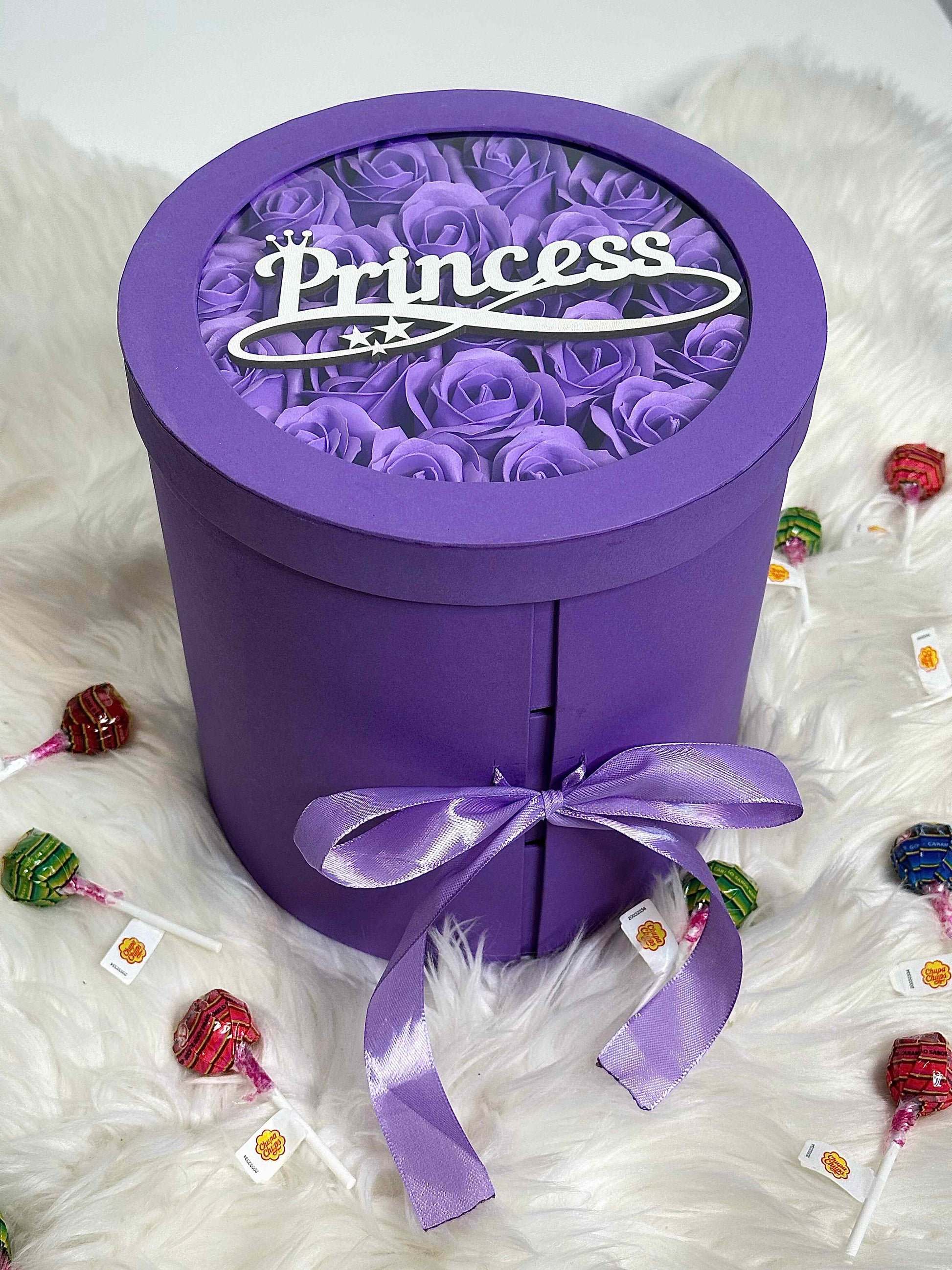 Close-up of the vibrant soap roses in the purple gift box, adding elegance and charm to this delightful present.