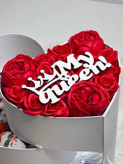 Close-up of Raffaello candies and Kinder chocolates arranged in the elegant three-tiered white gift box, combining sweetness and sophistication.